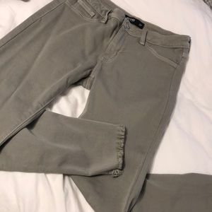 Frayed light green jeans